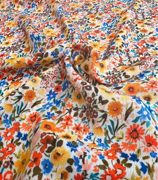 Tissu viscose crinkle - Semis floral orange bleue